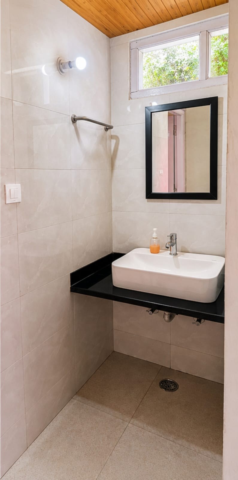 Clean modern attached bathroom with hot water at The Glide Inn cottages Shimla